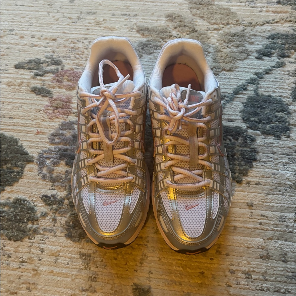 Size 9 Pink and Silver Nike p-6000s